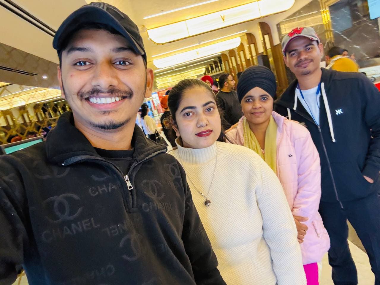 Whizcamp teammates taking a selfie during a casual outing at a shopping mall